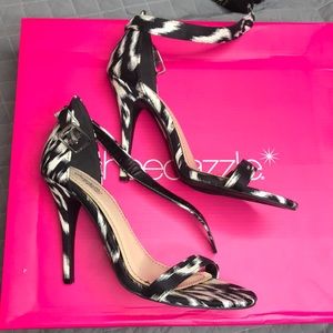 One strap black white heels